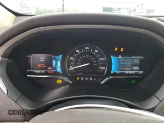 2015 Lincoln MKZ Hybrid z VIN 3LN6L2LUXFR609516, wystawiony jako Copart lot #57986625 z przebiegiem 110 268 mil mil oraz Szkody całkowita. Historia ofert i sprzedaży dostępna na DreamBid. Obrazek 9.