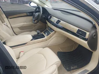 2011 Audi A8 z VIN WAURVAFD3BN019461, wystawiony jako IAAI lot #42211319 z przebiegiem 151 936 mil mil oraz . Historia ofert i sprzedaży dostępna na DreamBid. Obrazek 5.