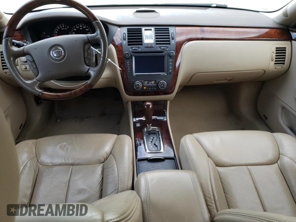2006 Cadillac DTS 1SD z VIN 1G6KD57Y86U146074, wystawiony jako Copart lot #52917235 z przebiegiem 133 956 mil mil oraz Tytuł czysty. Historia ofert i sprzedaży dostępna na DreamBid. Obrazek 8.
