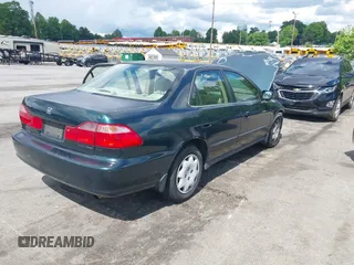 1999 Honda Accord LX z VIN JHMCG5644XC021926, wystawiony jako IAAI lot #42251802 z przebiegiem 218 291 mil mil oraz . Historia ofert i sprzedaży dostępna na DreamBid. Obrazek 4.
