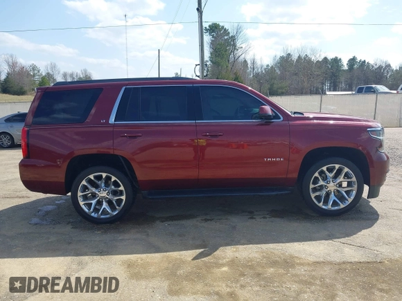 2019 Chevrolet Tahoe LT z VIN 1GNSCBKC9KR102552, wystawiony jako IAAI lot #41792517 z przebiegiem 92 856 mil mil oraz . Historia ofert i sprzedaży dostępna na DreamBid. Obrazek 13.