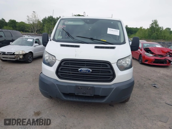 2016 Ford Transit Cargo with VIN 1FTYR1ZM3GKB39994, listed as a IAAI auction lot 42463512 with 108,813 mi miles and . Bid and sale history available at DreamBid. Image 12.
