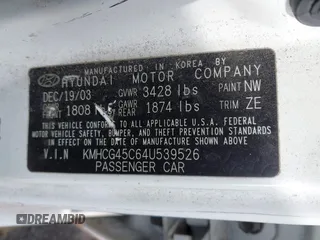 2004 Hyundai Accent GL with VIN KMHCG45C64U539526, listed as a IAAI auction lot 41199434 with 81,442 mi miles. Bid and sale history available at carsss.com. Image 9.