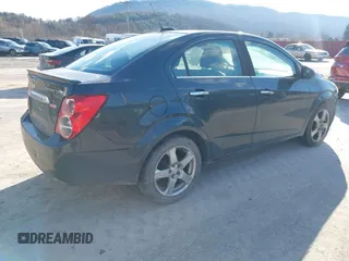 2015 Chevrolet Sonic LTZ z VIN 1G1JE5SB1F4100913, wystawiony jako IAAI lot #41039461 z przebiegiem 158 878 mil mil oraz . Historia ofert i sprzedaży dostępna na DreamBid. Obrazek 4.