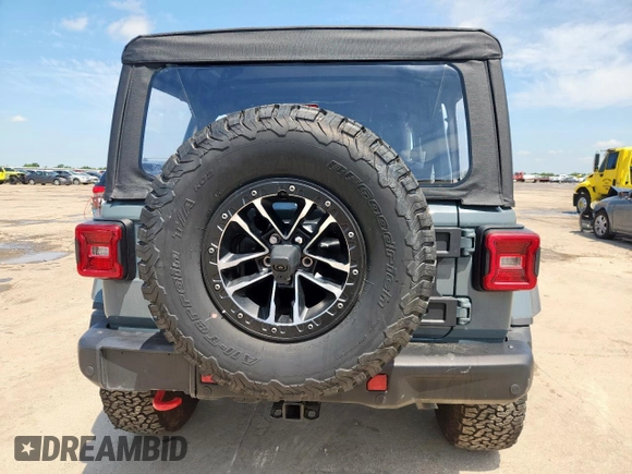2024 Jeep Wrangler Rubicon X with VIN 1C4RJXFGXRW247781, listed as a Copart auction lot 64393745 with 2,661 mi miles and Salvage title. Bid and sale history available at DreamBid. Image 6.