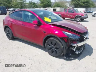 2025 Tesla Model Y Long Range z VIN 7SAYGAEE8SF265863, wystawiony jako IAAI lot #42186700 z przebiegiem 7 161 mil mil oraz . Historia ofert i sprzedaży dostępna na DreamBid. Obrazek 1.