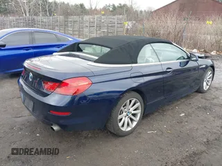 2013 BMW 6 Series 640i with VIN WBALW7C51DDX58713, listed as a IAAI auction lot 42005436 with 77,563 mi miles and . Bid and sale history available at carsss.com. Image 4.