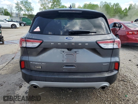 2021 Ford Escape Titanium Hybrid z VIN 1FMCU9DZ4MUA56645, wystawiony jako Copart lot #54059515 z przebiegiem 31 432 mil mil oraz Szkoda całkowita • Salvage title. Historia ofert i sprzedaży dostępna na DreamBid. Obrazek 6.