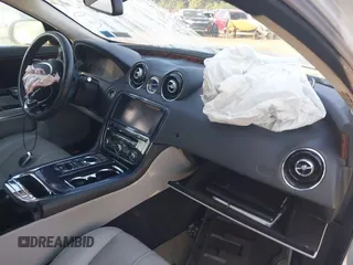 2011 Jaguar XJ with VIN SAJWA1CB1BLV05526, listed as a IAAI auction lot 40162505 with 56,961 mi miles and . Bid and sale history available at DreamBid. Image 5.