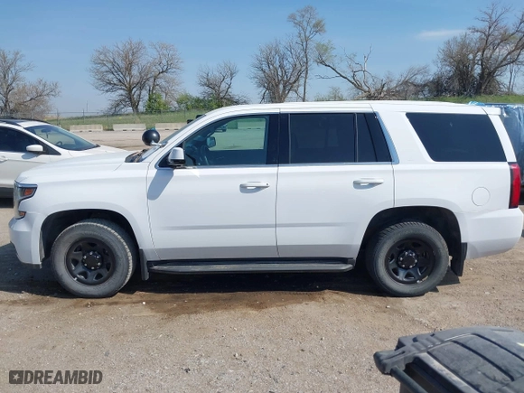 2020 Chevrolet Tahoe Commercial with VIN 1GNSKDEC8LR258254, listed as a IAAI auction lot 42104608 with 105,895 mi miles. Bid and sale history available at carsss.com. Image 15.