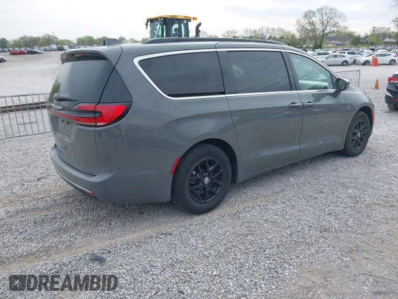 2022 Chrysler Pacifica Touring L with VIN 2C4RC1BG7NR168519, listed as a IAAI auction lot 41928929 with 55,814 mi miles and . Bid and sale history available at DreamBid. Image 4.