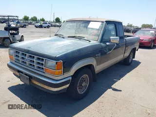 1990 Ford Ranger z VIN 1FTCR14T7LPB00718, wystawiony jako IAAI lot #42756062 z przebiegiem 77 393 mil mil oraz . Historia ofert i sprzedaży dostępna na DreamBid. Obrazek 2.