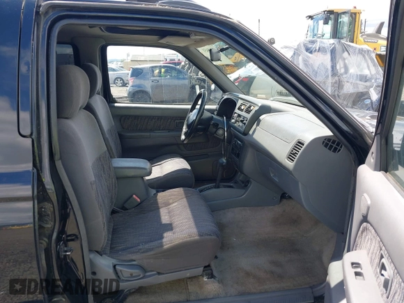 2000 Nissan Frontier XE with VIN 1N6ED27T3YC422325, listed as a IAAI auction lot 42268431 with 169,994 mi miles and . Bid and sale history available at DreamBid. Image 5.