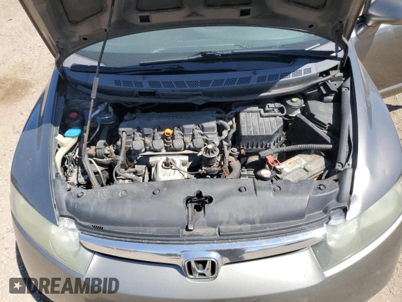 2006 Honda Civic LX z VIN 1HGFA16506L039485, wystawiony jako Copart lot #56109925 z przebiegiem 241 051 mil mil oraz Szkoda całkowita • Salvage title. Historia ofert i sprzedaży dostępna na DreamBid. Obrazek 11.