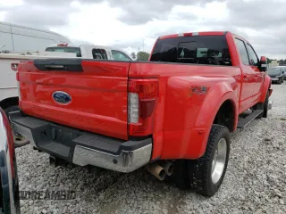 2018 Ford F-450 XL with VIN 1FT8W4DTXJEC07576, listed as a Copart auction lot 66168894 with 131,660 mi miles and Salvage Title. Bid and sale history available at carsss.com. Image 4.