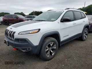 2014 Jeep Cherokee Trailhawk with VIN 1C4PJMBS8EW188045, listed as a Copart auction lot 61373835 with 119,092 mi miles and Clean title. Bid and sale history available at DreamBid. Image 1.