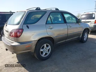 1999 Lexus RX 300 with VIN JT6HF10U6X0092078, listed as a IAAI auction lot 41988259 with 144,148 mi miles and . Bid and sale history available at DreamBid. Image 4.