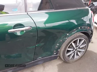 2019 MINI Convertible Cooper S z VIN WMWWG9C5XK3E40620, wystawiony jako IAAI lot #42379122 z przebiegiem 5 496 mil mil oraz . Historia ofert i sprzedaży dostępna na DreamBid. Obrazek 17.