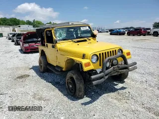2004 Jeep Wrangler Sport with VIN 1J4FA49S84P753317, listed as a Copart auction lot 55872965 with 185,763 mi miles and Salvage title. Bid and sale history available at DreamBid. Image 15.