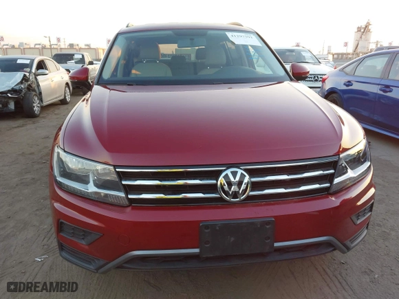 2018 Volkswagen Tiguan S with VIN 3VV1B7AX9JM068218, listed as a IAAI auction lot 41297391 with 41,143 mi miles. Bid and sale history available at carsss.com. Image 12.