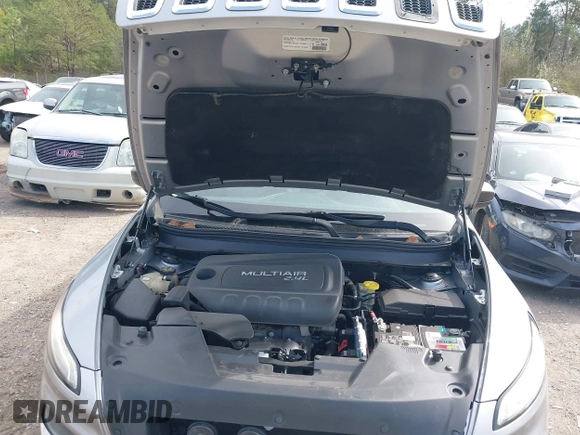 2014 Jeep Cherokee Sport with VIN 1C4PJLAB2EW163332, listed as a IAAI auction lot 41752003 with 154,832 mi miles and . Bid and sale history available at DreamBid. Image 10.