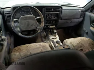 1997 Jeep Cherokee Sport with VIN 1J4FJ68S2VL518188, listed as a Copart auction lot 77459464 with 0 mi miles and Non Repairable. Bid and sale history available at carsss.com. Image 8.
