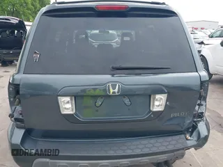 2005 Honda Pilot EX-L with VIN 5FNYF18565B046464, listed as a IAAI auction lot 41879495 with 228,021 mi miles. Bid and sale history available at carsss.com. Image 6.