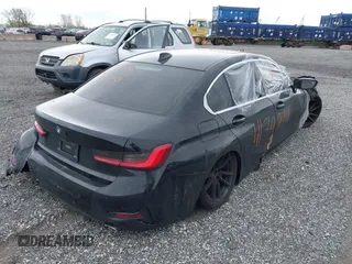 2020 BMW 3 Series 330i with VIN 3MW5R1J09L8B07586, listed as a IAAI auction lot 42067140 with 71,845 mi miles and . Bid and sale history available at carsss.com. Image 4.