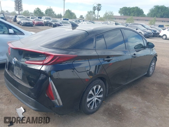 2020 Toyota Prius LE with VIN JTDKARFP7L3145683, listed as a IAAI auction lot 42004199 with 187,491 mi miles and . Bid and sale history available at DreamBid. Image 4.