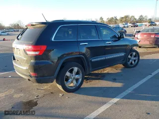 2012 Jeep Grand Cherokee Limited with VIN 1C4RJFBG2CC332218, listed as a IAAI auction lot 41029135 with 198,675 mi miles. Bid and sale history available at carsss.com. Image 4.