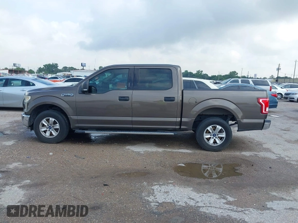 2015 Ford F-150 XLT with VIN 1FTEW1C81FKD15088, listed as a IAAI auction lot 42044616 with 159,248 mi miles and . Bid and sale history available at carsss.com. Image 14.