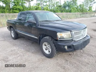 2008 Dodge Dakota Laramie z VIN 1D7HW58N88S633009, wystawiony jako IAAI lot #42337592 z przebiegiem 91 274 mil mil oraz . Historia ofert i sprzedaży dostępna na DreamBid. Obrazek 1.