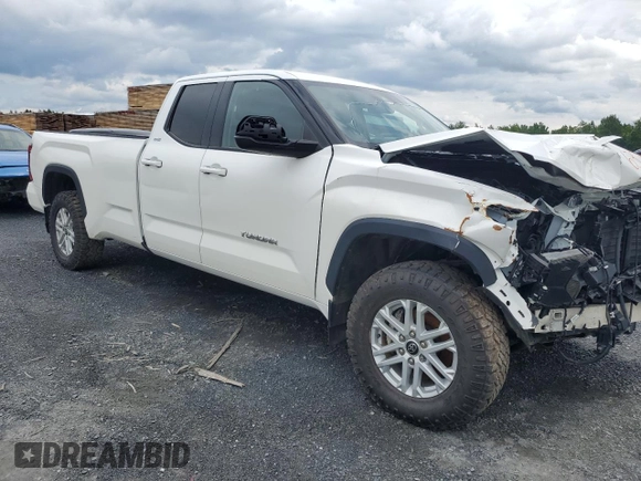2023 Toyota Tundra SR5 with VIN 5TFLA5GD1PX002017, listed as a Copart auction lot 63232925 with 8,666 mi miles and Salvage title. Bid and sale history available at DreamBid. Image 4.
