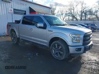 2015 Ford F-150 XLT with VIN 1FTEW1EG0FKD55134, listed as a IAAI auction lot 41166087 with 235,652 mi miles. Bid and sale history available at carsss.com. Image 1.