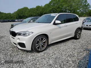 2015 BMW X5 xDrive50i z VIN 5UXKR6C5XF0J77462, wystawiony jako Copart lot #58912895 z przebiegiem 100 086 mil mil oraz Czysty tytuł • Clean title. Historia ofert i sprzedaży dostępna na DreamBid. Obrazek 1.