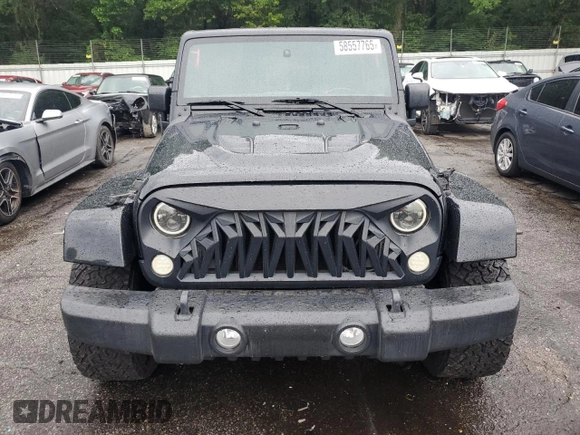 2015 Jeep Wrangler Unlimited Sahara with VIN 1C4BJWEG6FL643460, listed as a Copart auction lot 58557765 with 130,181 mi miles and Salvage title. Bid and sale history available at DreamBid. Image 5.