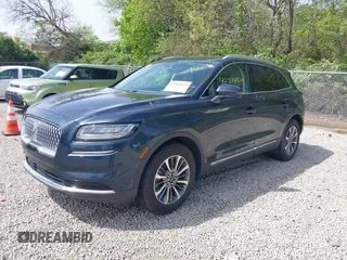2021 Lincoln Nautilus Standard z VIN 2LMPJ8J92MBL10856, wystawiony jako IAAI lot #42204825 z przebiegiem 26 694 mil mil oraz . Historia ofert i sprzedaży dostępna na DreamBid. Obrazek 2.