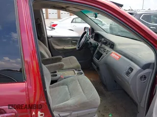 2002 Honda Odyssey EX with VIN 5FNRL18612B028570, listed as a IAAI auction lot 42491201 with 203,401 mi miles and . Bid and sale history available at DreamBid. Image 5.