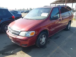 2001 Chevrolet Venture Warner Bros 1SE Pkg with VIN 1GNDX13E01D201117, listed as a IAAI auction lot 41442279 with 148,090 mi miles. Bid and sale history available at carsss.com. Image 2.