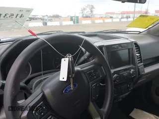 2019 Ford F-150 XL with VIN 1FTEW1CBXKFC64236, listed as a IAAI auction lot 41531279 with 102,965 mi miles and . Bid and sale history available at carsss.com. Image 11.