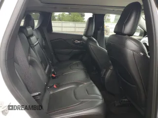 2019 Jeep Cherokee Trailhawk Elite with VIN 1C4PJMBX7KD140720, listed as a Copart auction lot 64268064 with 61,747 mi miles and Salvage Title. Bid and sale history available at carsss.com. Image 10.