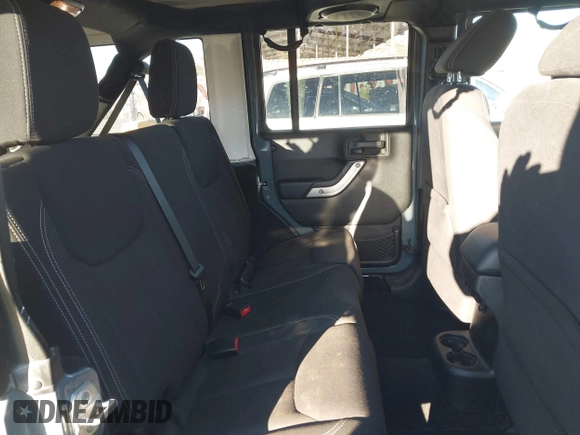 2014 Jeep Wrangler Unlimited Rubicon X with VIN 1C4BJWFG3EL134522, listed as a IAAI auction lot 41221381 with 66,897 mi miles and . Bid and sale history available at DreamBid. Image 8.