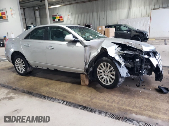2013 Cadillac CTS Luxury with VIN 1G6DG5E53D0125288, listed as a Copart auction lot 56601085 with 116,183 mi miles and Salvage title. Bid and sale history available at DreamBid. Image 4.