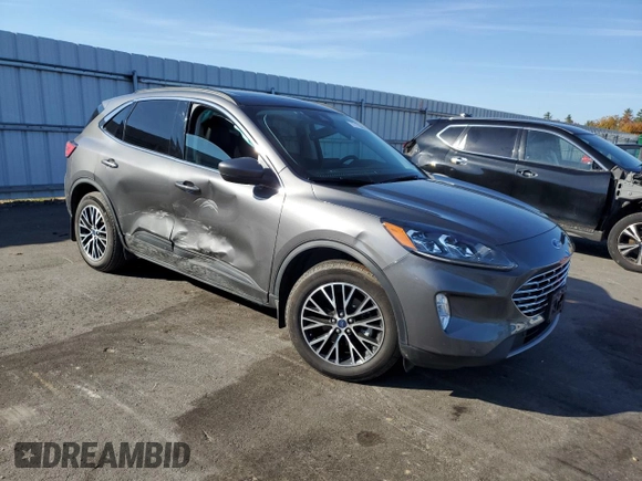 2022 Ford Escape Titanium Plug-In Hybrid with VIN 1FMCU0LZ8NUB74213, listed as a Copart auction lot 77133004 with 18,490 mi miles and Salvage title. Bid and sale history available at DreamBid. Image 4.