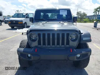 2019 Jeep Wrangler Unlimited Rubicon with VIN 1C4HJXFN9KW507281, listed as a IAAI auction lot 42695939 with 60,802 mi miles and . Bid and sale history available at DreamBid. Image 6.