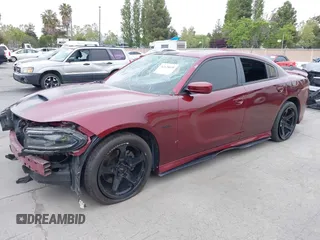 2019 Dodge Charger R/T with VIN 2C3CDXCT2KH749207, listed as a IAAI auction lot 42120658 with 52,330 mi miles and . Bid and sale history available at carsss.com. Image 19.