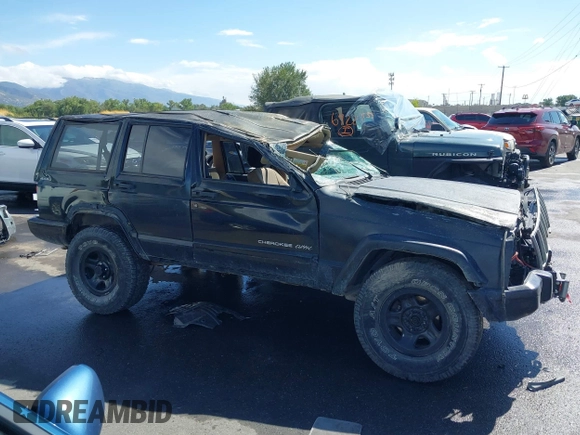 2000 Jeep Cherokee Classic with VIN 1J4FF58S5YL134745, listed as a IAAI auction lot 40352984 with 1 mi miles. Bid and sale history available at carsss.com. Image 10.