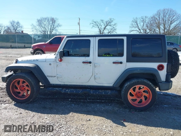 2016 Jeep Wrangler Unlimited Rubicon Hard Rock with VIN 1C4HJWFG9GL296782, listed as a IAAI auction lot 41595273 with 113,338 mi miles. Bid and sale history available at carsss.com. Image 14.
