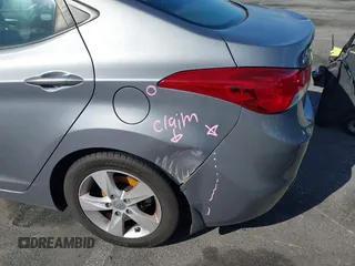 2013 Hyundai Elantra Limited with VIN KMHDH4AE6DU493169, listed as a IAAI auction lot 41507048 with 89,404 mi miles and . Bid and sale history available at DreamBid. Image 6.