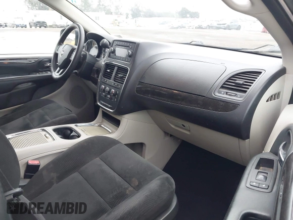 2016 Dodge Grand Caravan SXT with VIN 2C4RDGCG0GR262887, listed as a IAAI auction lot 42097766 with 55,491 mi miles and . Bid and sale history available at DreamBid. Image 5.